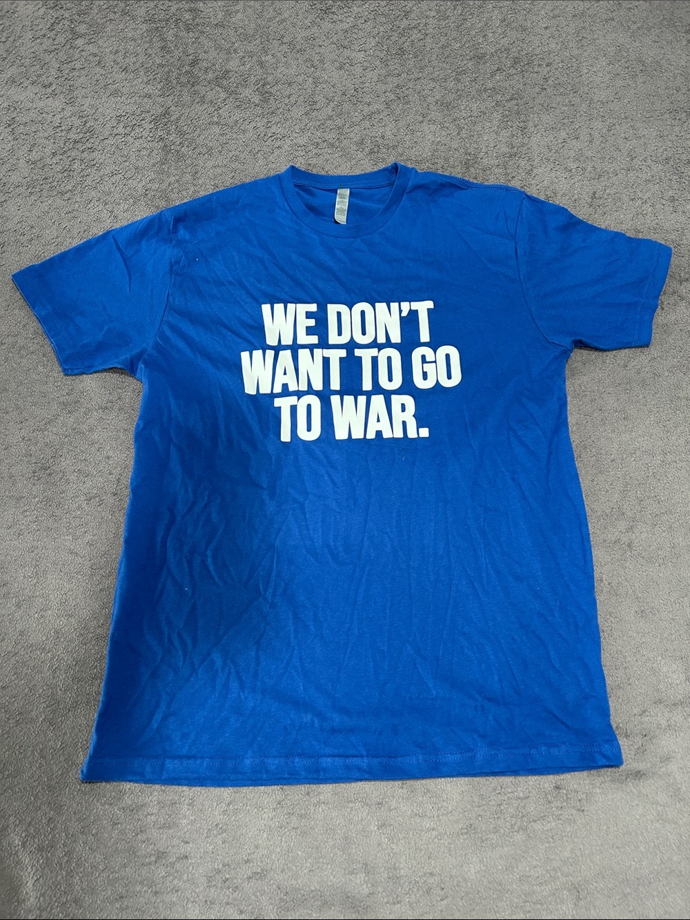 Blue Graphic Tee - "We Don't Want To Go To War."